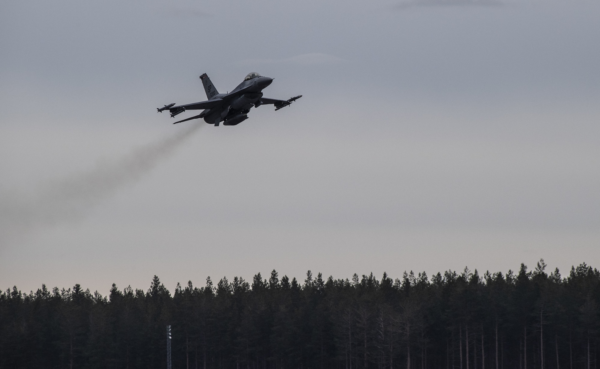 A U.S. Air Force F-16 Fighting Falcon from the 480th Fighter Squadron at Spangdahlem Air Base, Germany, takes off from the runway at Kallax Air Base, Sweden, May 19, 2021. Airmen from the 52nd Fighter Wing deployed to Sweden two weeks prior to the start of Arctic Challenge Exercise 2021 in order to maximize training with the Swedish air force during Spangdahlem's flightline repairs. (U.S. Air Force photo by Senior Airman Ali Stewart)