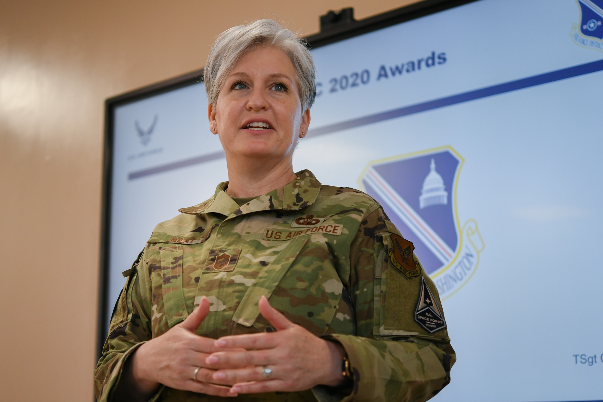 Chief Master Sgt. Natalie Gray, U.S. Air Force religious affairs senior enlisted advisor, briefs Chaplain Corps members in the National Capital Region about the importance of the Annual Awards Presentation at Chapel 1, Joint Base Andrews, Md., May 18, 2021. Gray and Maj. Gen. Steven A. Schaick, chief of chaplains, were featured guests at the ceremony. (U.S. Air Force photo by Airman 1st Class Bridgitte Taylor)
