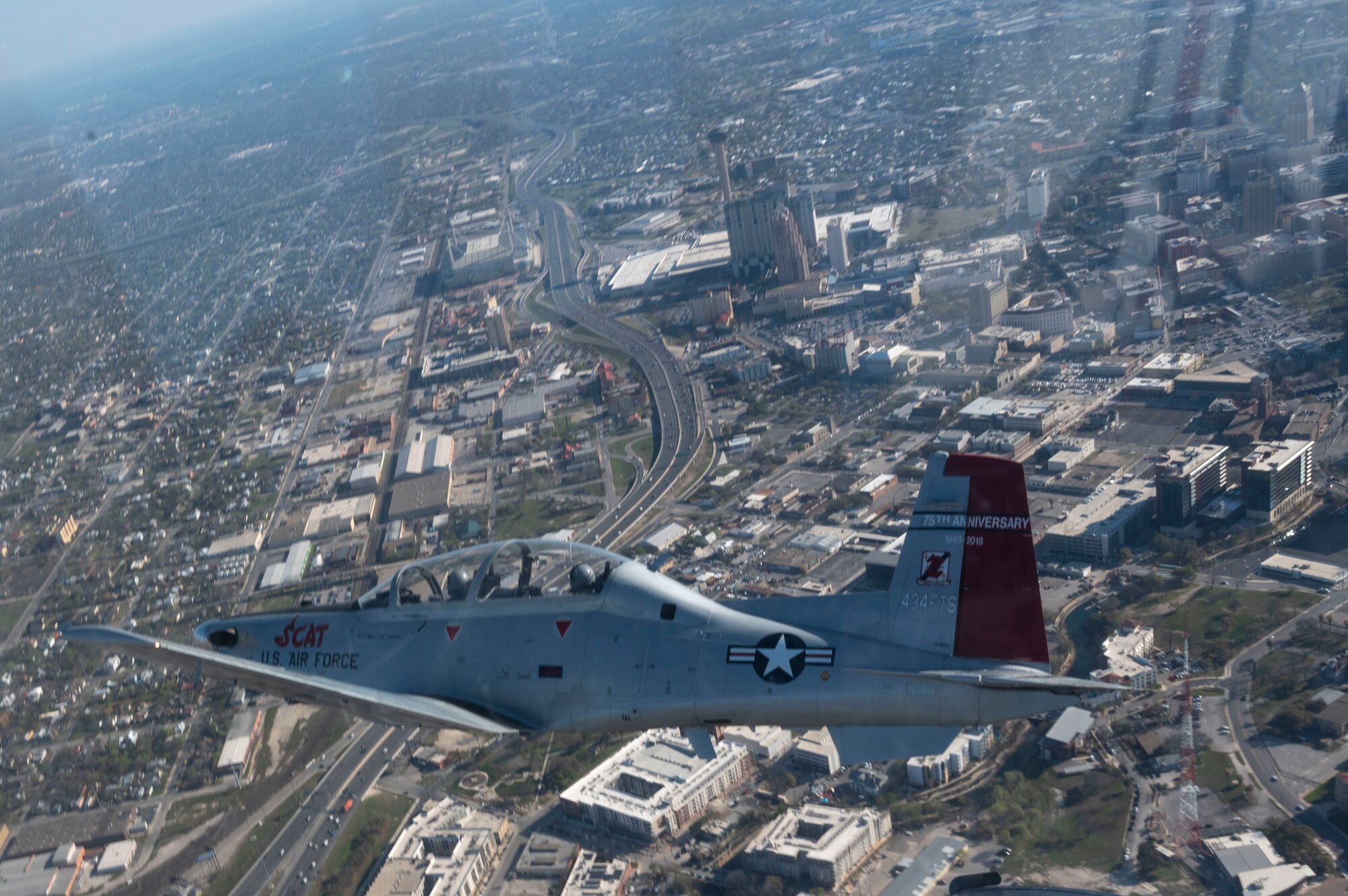 The 434th Flying Training Squadron flagship flies cross-country from Laughlin Air Force Base, Texas, Mar. 20. 2021. The 434th FTS flagship is a symbol of the squadron spirit, and this flagship was painted to commemorate the P-51 Mustang from World War II, flown by Robin Olds.(U.S. Air Force photo by Airman 1st Class David Phaff)