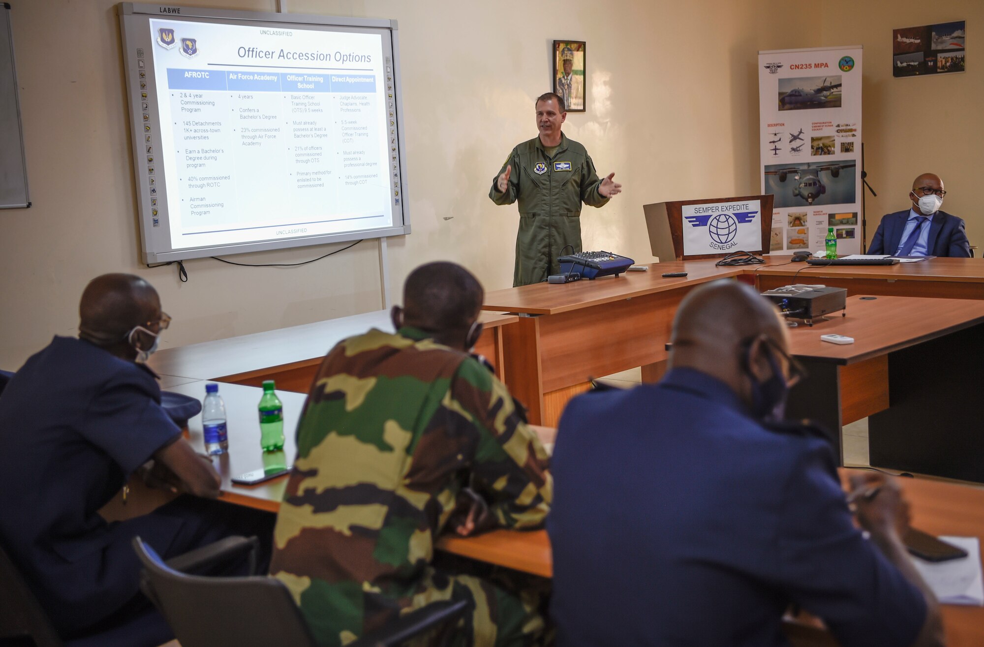 Col. Jeffery Patton, deputy director of U.S. Air Forces in Europe plans, programs and analyses, discusses U.S. Air Force doctrine with Senegalese air force members in Dakar, Senegal, May 27, 2021. Throughout the engagement, Airmen facilitated several discussions with their Senegalese peers on topics such as leadership, airmanship, administrative processes, doctrine and personnel management. (U.S. Air Force photo by 1st Lt. Hannah Durbin)