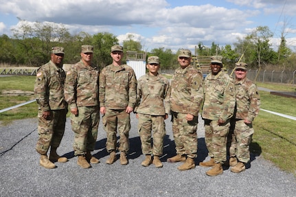 Sgt. Samuel Johnson (center left) and Spc. Michael Choi (center right) are joined by Virginia National Guard senior noncommissioned officers May 12, 2021, during the Region II Best Warrior Competition at Fort Indiantown Gap, Pennsylvania.