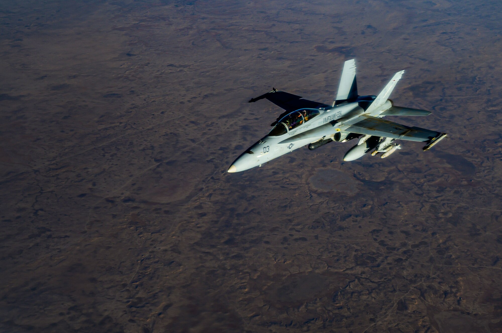 A U.S. Marine Corps F/A-18D Hornet aircraft from Marine All Weather Attack Squadron 224, Marine Aircraft Group 31, flies a mission supporting a Dynamic Force Employment over the U.S. Central Command area of responsibility, May 18, 2021. DFEs enhance Central Command’s ability to deter aggression and promote security and stability within the area of responsibility (U.S. Air Force photo by Tech. Sgt. Robert Harnden)