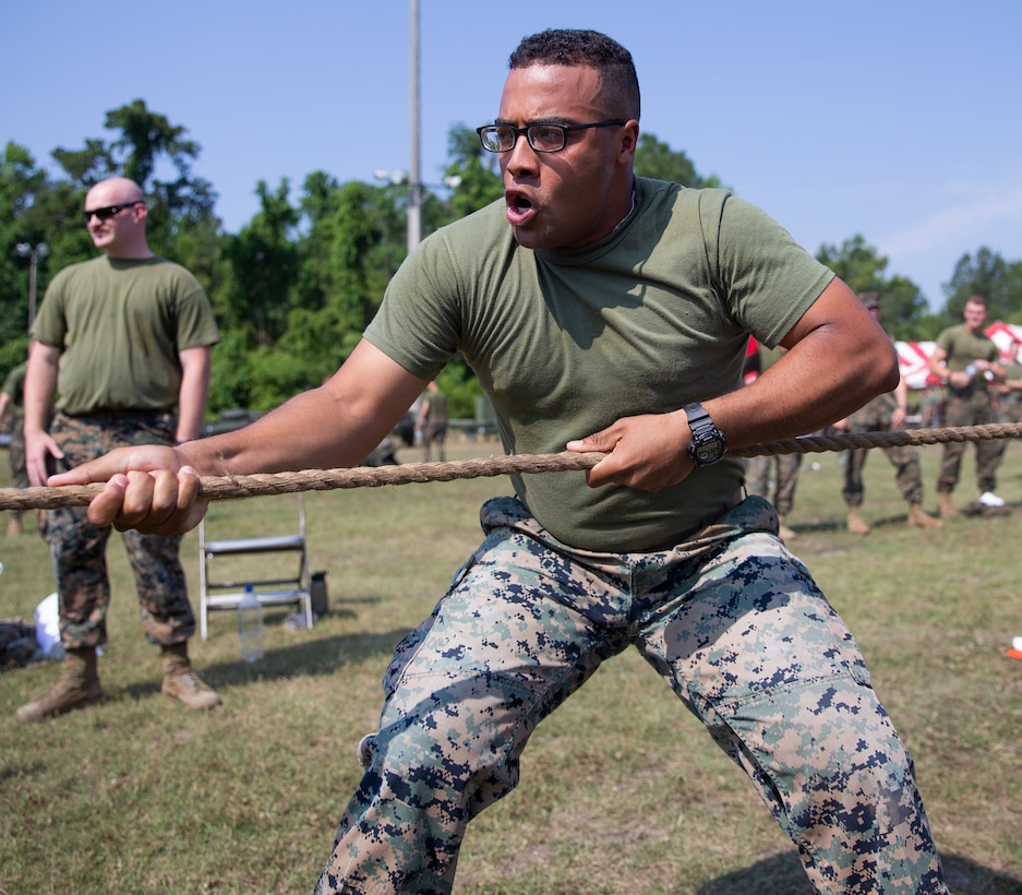 A Marine with 10th Marine Regiment (10th Marines), 2d Marine Division, competes in tug-of-war during the Kings Game at Camp Lejeune, N.C., March 27, 2021. The Kings Game is an annual event where Marines from 10th Marines compete in various competitions to strengthen the unit's esprit de corps. (U.S. Marine Corps photo by Lance Cpl. Michael Virtue)