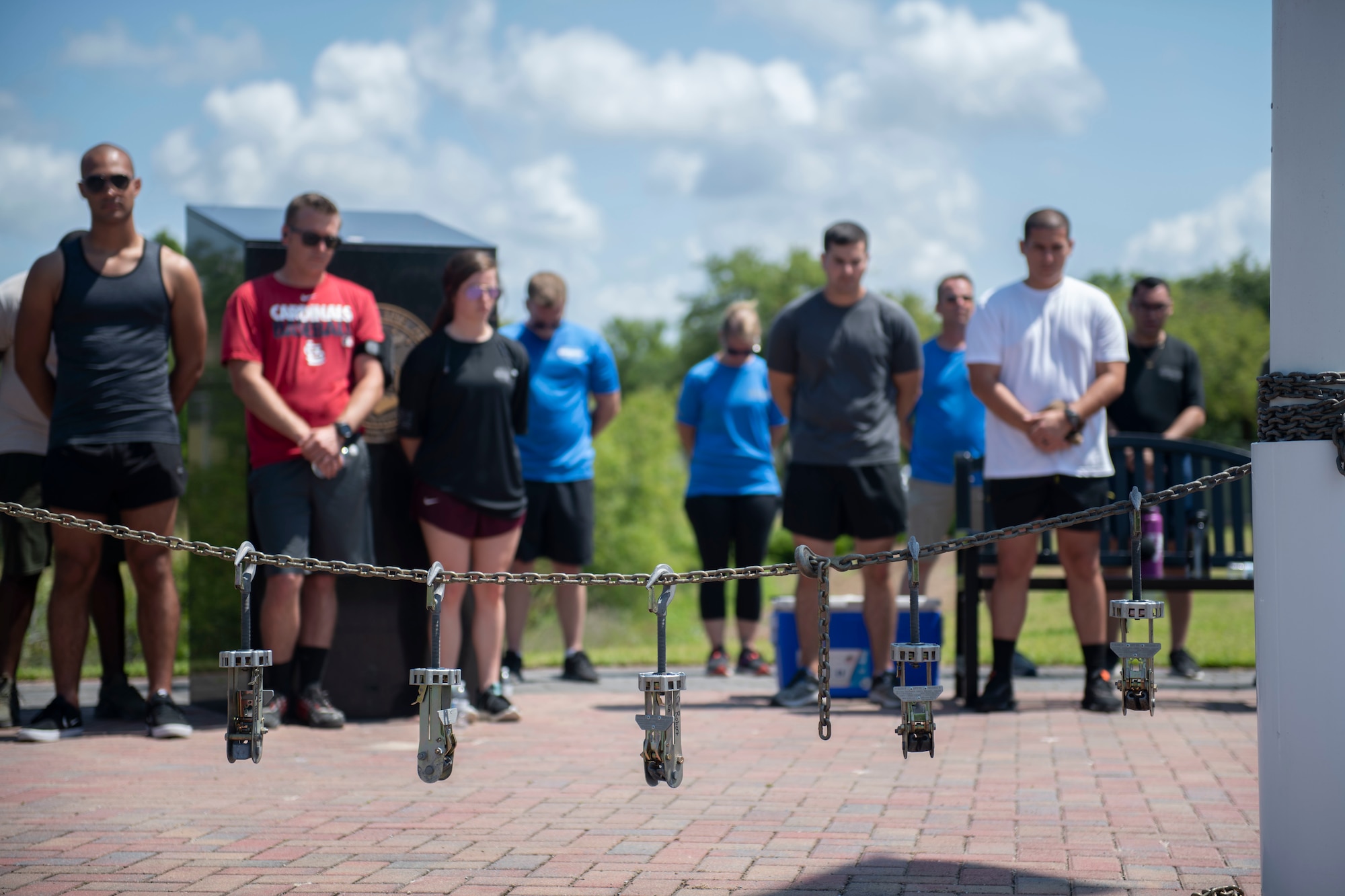 Airmen standing during memorial service.