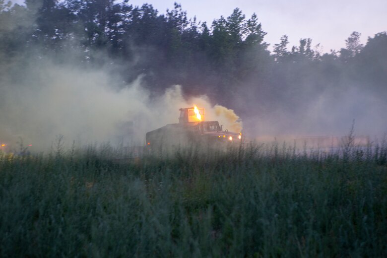 U.S. Marines with 2d Light Armored Reconnaissance Battalion, 2d Marine Division, take notional fire during a Marine Corps Combat Readiness Evaluation (MCCRE) at Fort Pickett, Va., May 19, 2021. A MCCRE is an exercise designed to formally evaluate a unit's combat readiness and if successful, the unit will achieve apex status and is deemed ready for global employment. (U.S. Marine Corps photo by Pfc. Sarah Pysher)