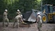 U.S. Air Force Airmen assigned to the 354th Civil Engineer Squadron construct steps during a troop training project May 26, 2021, at the Birch Lake Military Recreation Area, Alaska. To give the troops a sense of competition, the squadron encouraged the teams to complete one small personal renovation in addition to their assigned projects. Most teams built a bench by the cabin they renovated, while others took a different approach such as adding gravel steps to make it easier for people to traverse the campgrounds. (U.S. Air Force photo by Senior Airman Beaux Hebert)