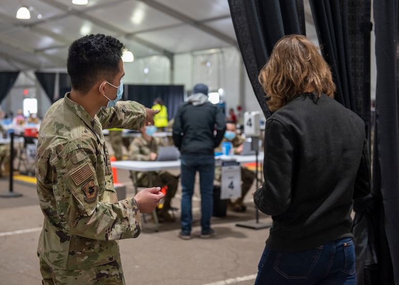 Airman talking to civilian