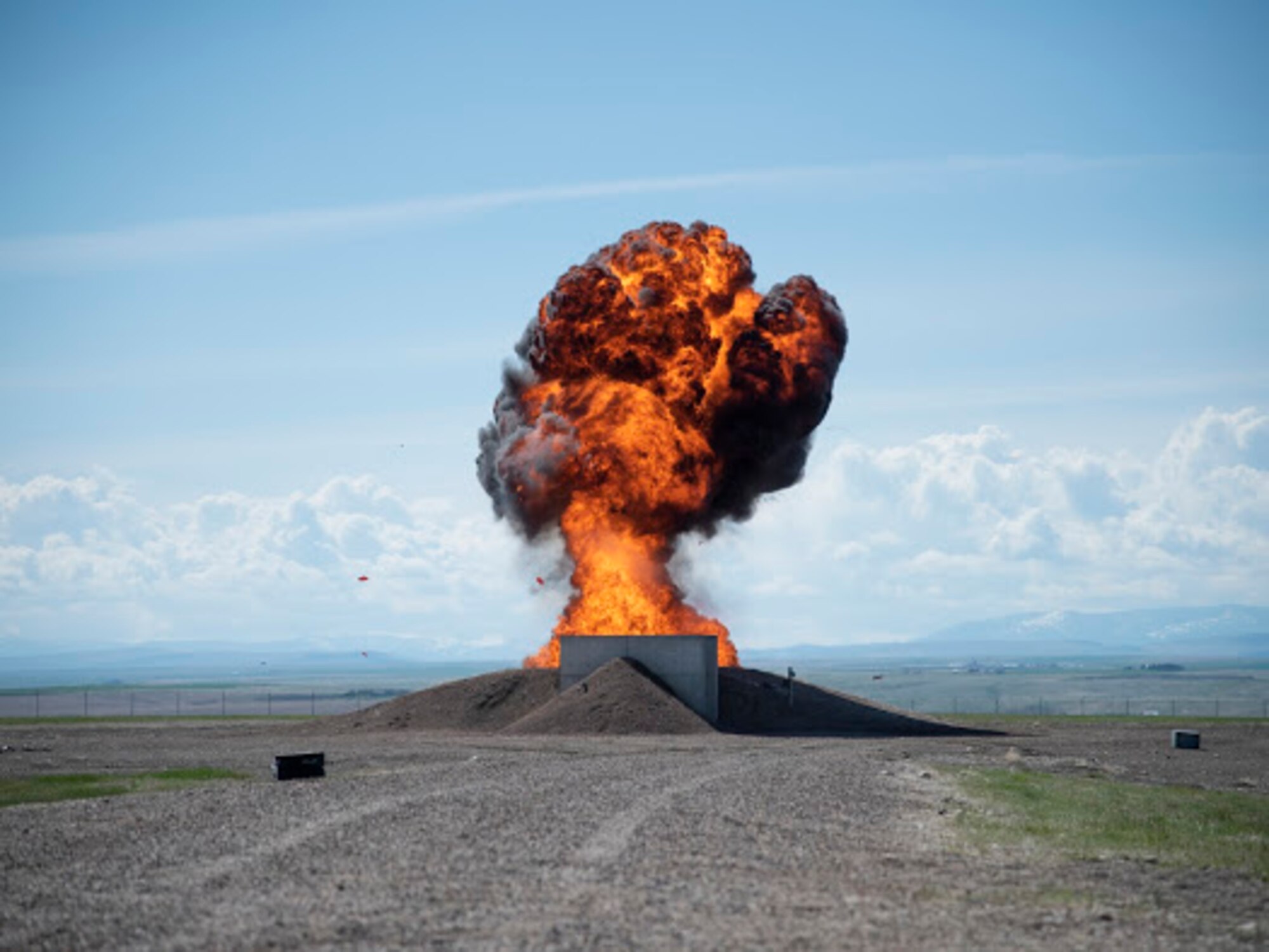 A fireball rises into the air during a training demonstration by the 341st Civil Engineer Squadron explosive ordnance disposal team May 14, 2021 at Malmstrom Air Force Base, Mont.