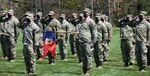 Soldiers assigned to Headquarters Company, 86th Infantry Brigade Combat Team (Mountain), Vermont National Guard, salute during their deployment ceremony at Camp Ethan Allen Firing Range, Jericho, Vermont, May 14, 2021. Family and friends gathered to support the Soldiers during the ceremony. (U.S. Army National Guard photo by Joshua T. Cohen)