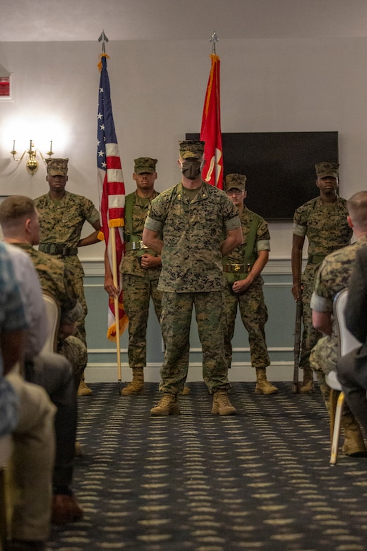 U.S. Marine Corps Maj. George Chronis, the executive officer for 2nd Network Battalion, stands at parade rest with the Marine Corps Installations East-Marine Corps Base Camp Lejeune color guard during the activation ceremony of 2nd Network Battalion on MCB Camp Lejeune, North Carolina, June 3, 2021. 2nd Network Battalion was activated to ensure the operation of a resilient network that enables mission execution in the face of persistent cyber threats. (U.S. Marine Corps photo by Lance Cpl. Isaiah Gomez)