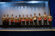 Marines with Headquarters and Headquarters Squadron graduate Martial Arts Instructor Course 166-21 at Marine Corps Air Station Yuma, Ariz. May 27, 2021. The course allows the newly trained Marines to teach and award the next belt level to deserving Marines. (U.S. Marine Corps photo by Lance Cpl. Matthew Romonoysky-Bean)