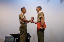 Marines with Headquarters and Headquarters Squadron graduate Martial Arts Instructor Course 166-21 at Marine Corps Air Station Yuma, Ariz. May 27, 2021. The course allows the newly trained Marines to teach and award the next belt level to deserving Marines. (U.S. Marine Corps photo by Lance Cpl. Matthew Romonoysky-Bean)