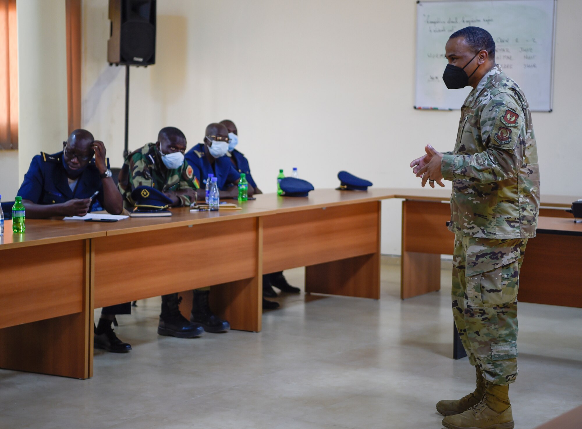 Chief Master Sgt. Terrance Smiley, Kisling Non-commissioned Officer Academy commandant, discusses leadership and followership with Senegalese air force members in Thies, Senegal, May 26, 2021. Throughout the engagement, Airmen facilitated several discussions with their Senegalese peers on topics such as leadership, airmanship, administrative processes, doctrine and personnel management. (U.S. Air Force photo by 1st Lt. Hannah Durbin)