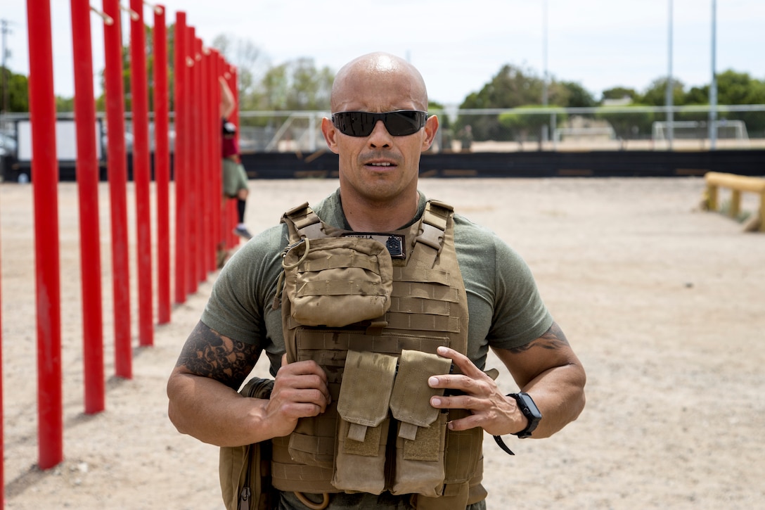 U.S. Marine Corps Sgt. Maj. Luis A. Galvez, the SgtMaj. for Headquarters & Headquarters Squadron (H&HS), Marine Corps Air Station (MCAS) Yuma, poses after completing a squadron MURPH challenge on MCAS Yuma, Ariz., May 26, 2021.