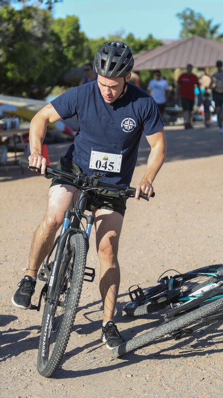 U.S. Marines with Headquarters and Headquarters Squadron (H&HS) compete in a squadron competition at Lake Martinez, Ariz., May 28, 2021. The competition consisted of a triathlon style challenge as a way of improving morale and comradery through competition between the different sections of H&HS. (U.S. Marine Corps photo by Sgt. Jason Monty)