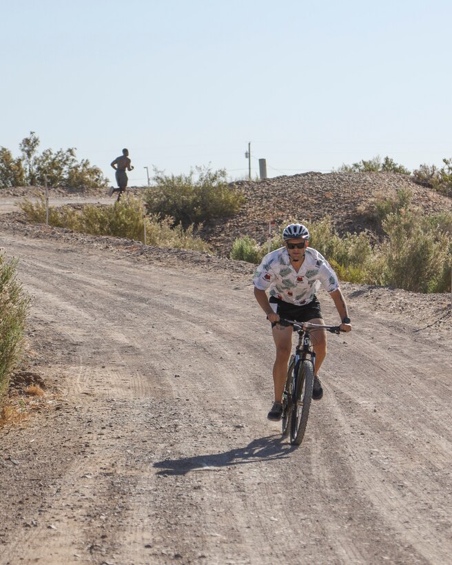 U.S. Marines with Headquarters and Headquarters Squadron (H&HS) compete in a squadron competition at Lake Martinez, Ariz., May 28, 2021. The competition consisted of a triathlon style challenge as a way of improving morale and comradery through competition between the different sections of H&HS. (U.S. Marine Corps photo by Sgt. Jason Monty)