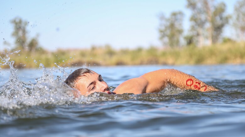 U.S. Marines with Headquarters and Headquarters Squadron (H&HS) compete in a squadron competition at Lake Martinez, Ariz., May 28, 2021. The competition consisted of a triathlon style challenge as a way of improving morale and comradery through competition between the different sections of H&HS. (U.S. Marine Corps photo by Sgt. Jason Monty)
