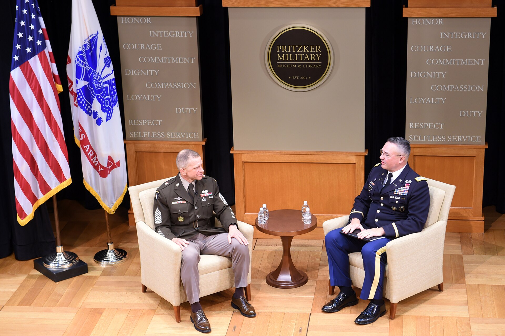 Sgt. Maj. Of the Army, Michael A. Grinston (left) participates in a recorded interview at the Pritzker Military Museum & Library in in Chicago, followed by a question and answers session, May 28, 2021.