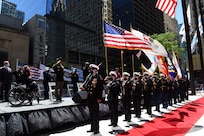 Sgt. Maj. of the Army, Michael A. Grinston, salutes the American Flag during the presentation of Colors at the City of Chicago’s Memorial Day commemoration, May 29, 2021.