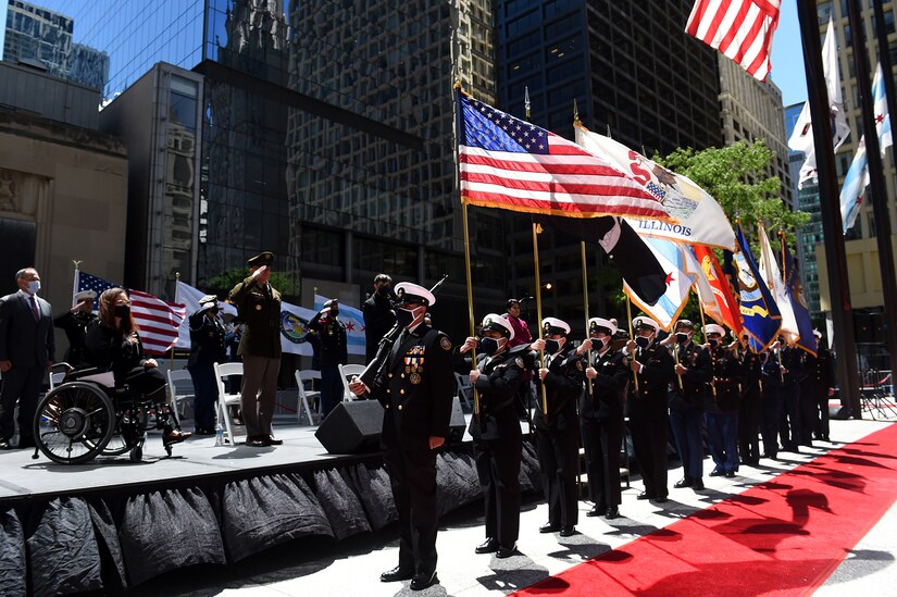 Sgt. Maj. of the Army, Michael A. Grinston, salutes the American Flag during the presentation of Colors at the City of Chicago’s Memorial Day commemoration, May 29, 2021.