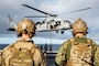 Sailors  conduct fast-rope training from an MH-60S Sea Hawk on the flight deck of the U.S. Navy’s only forward-deployed aircraft carrier USS Ronald Reagan (CVN 76).