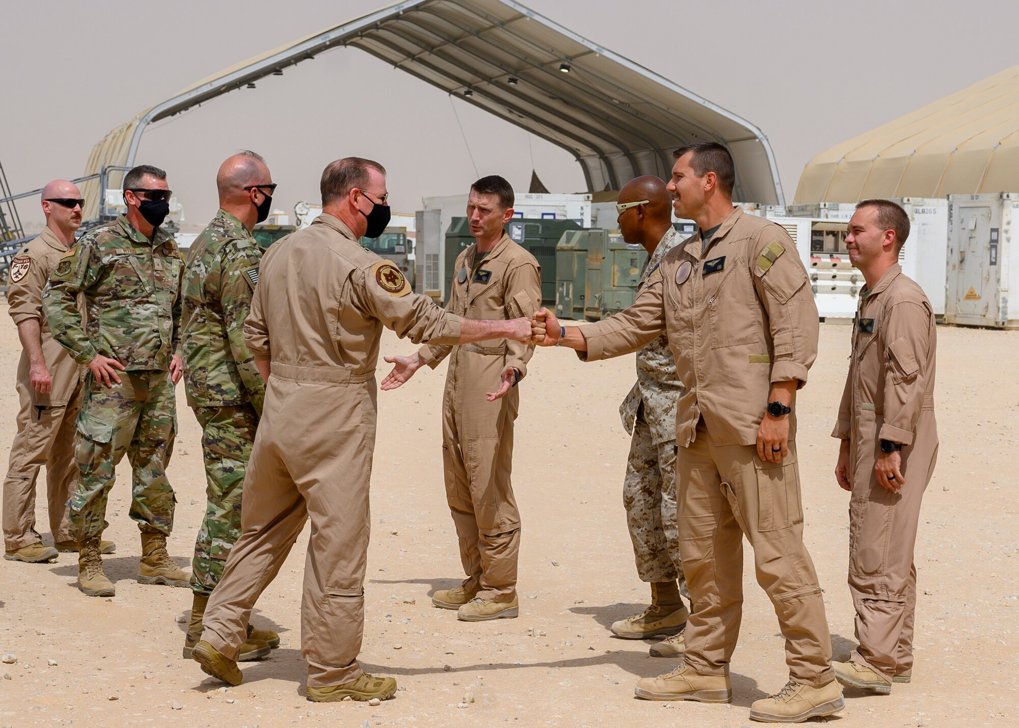 U.S. joint forces personnel assigned to Prince Sultan Air Base welcome Maj. Gen David Meyer, 9th Air Force (Air Forces Central) deputy commander and Deputy Combined Force Air Component Commander, during his visit to PSAB, Kingdom of Saudi Arabia, May 26, 2021. Several U.S. generals from across the region and their staff visited units at PSAB, meeting with various personnel to learn about defense efforts and expanding capabilities on base. (U.S. Air Force photo by Senior Airman Samuel Earick)