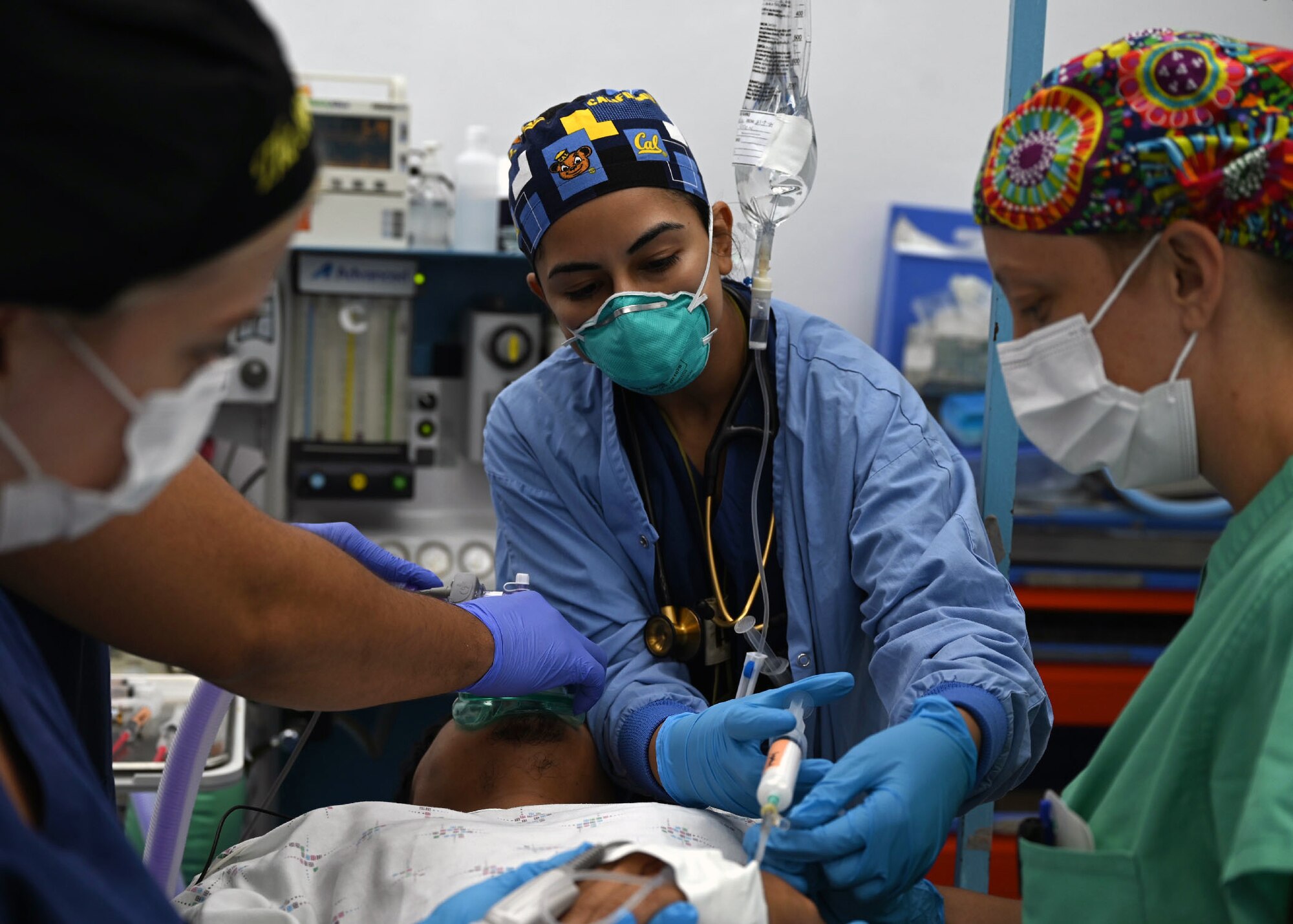 Air Force Capt. Kimpreet Kaur, an anesthesiologist with the 59th Medical Wing, Joint Base San Antonio-Lackland, anesthetizes a patient before surgery.