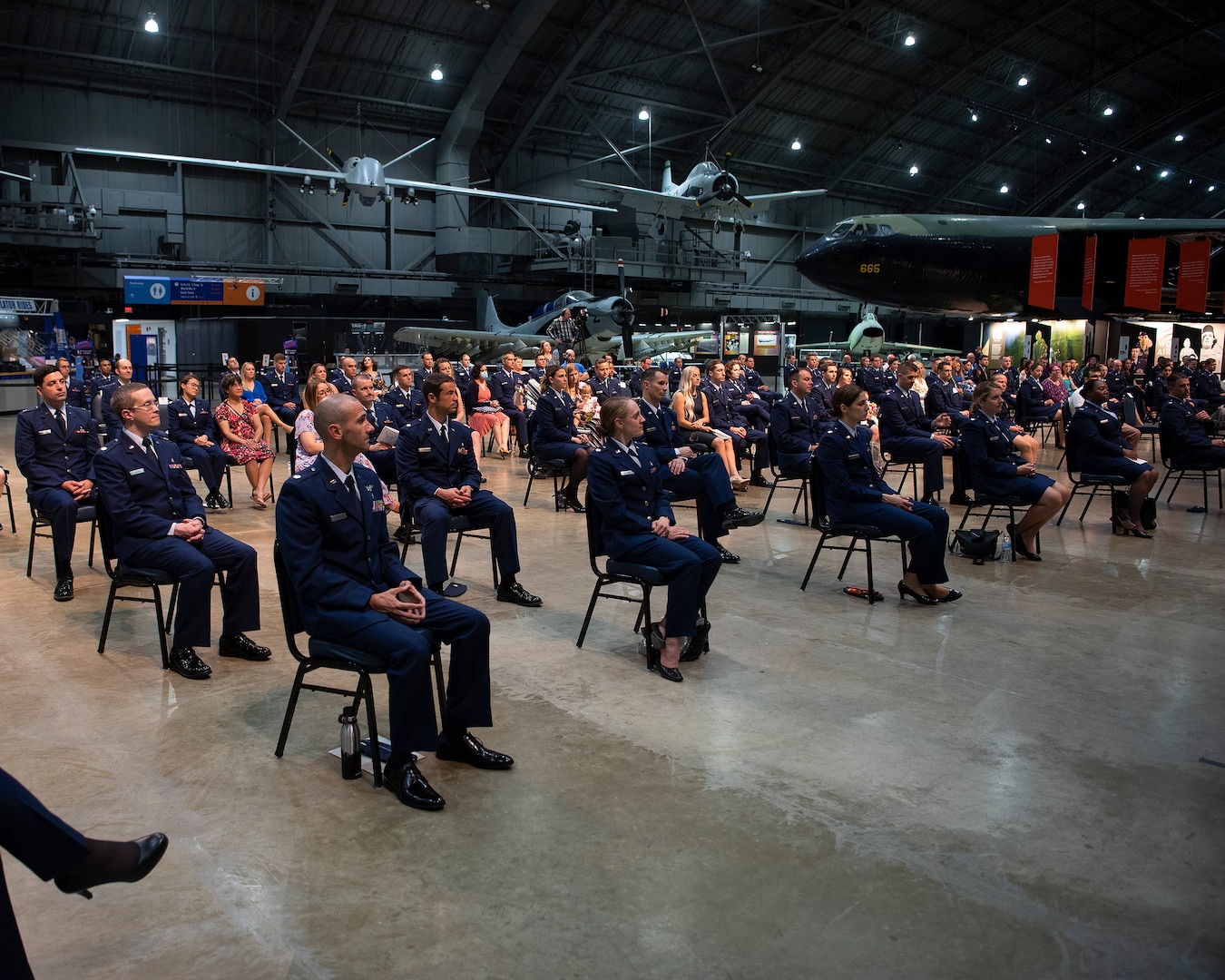 Graduates, program directors and a few select guests listen to Lt. Gen. Dorothy Hogg, U.S. Air Force surgeon general, give the graduation address at the Wright-Patterson Medical and Allied Health Education Programs graduation ceremony May 27, 2021, in the National Museum of the U.S. Air Force. More than 70 Air Force officers are recognized for completing their medical residencies in local hospitals including the Wright-Patterson Air Force Base, Ohio, Medical Center and the Dayton Veterans Affairs Medical Center. (U.S. Air Force photo by R.J. Oriez)