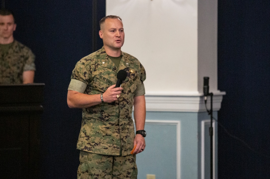U.S. Marine Corps Lt. Col. Karl W. Schlegel, the commanding officer for 2nd Network Battalion, gives his remarks during the activation ceremony of 2nd Network Battalion on Marine Corps Base Camp Lejeune, North Carolina, June 3, 2021. 2nd Network Battalion was activated to ensure the operation of a resilient network that enables mission execution in the face of persistent cyber threats. (U.S. Marine Corps photo by Lance Cpl. Isaiah Gomez)