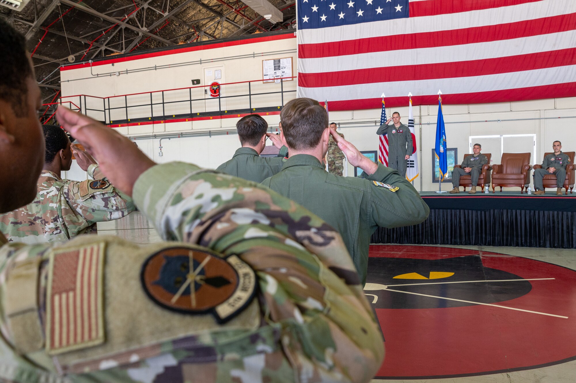 U.S. Air Force Lt. Col. Michael Opresko, incoming 5th Reconnaissance Squadron commander, receives his first salute from 5th RS Airmen during the 5th RS change of command at Osan Air Base, Republic of Korea, June 4, 2021. The first salute rendered is a tradition to honor the new commander upon their assumption of the command. (U.S. Air Force photo by Senior Airman Branden Rae)