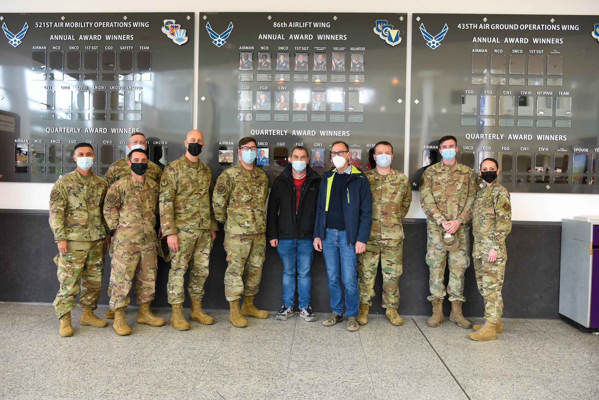 Michael Heinz, Center, was named Airlifter of the Week at Ramstein Air Base May 27, 2021.