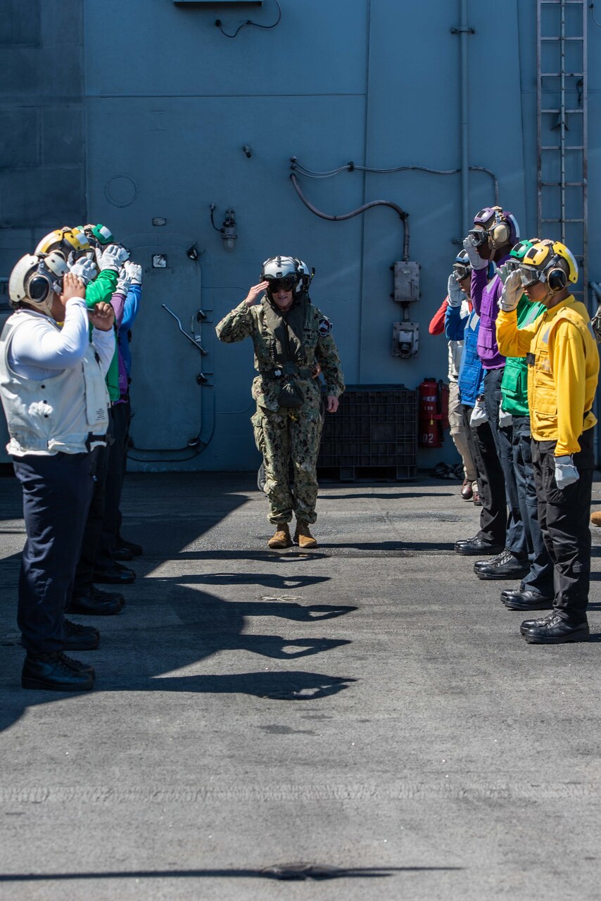 PHILIPPINE SEA (June 2, 2021) Vice Adm. Bill Merz, commander, U.S. 7th Fleet, departs the U.S. Navy’s only forward-deployed aircraft carrier USS Ronald Reagan (CVN 76). During Merz’s visit he attended meetings with warfare commanders and provided a message to the crew over the ship’s announcement system. Ronald Reagan, the flagship of Carrier Strike Group 5, provides a combat-ready force that protects and defends the United States, as well as the collective maritime interests of its allies and partners in the Indo-Pacific region.