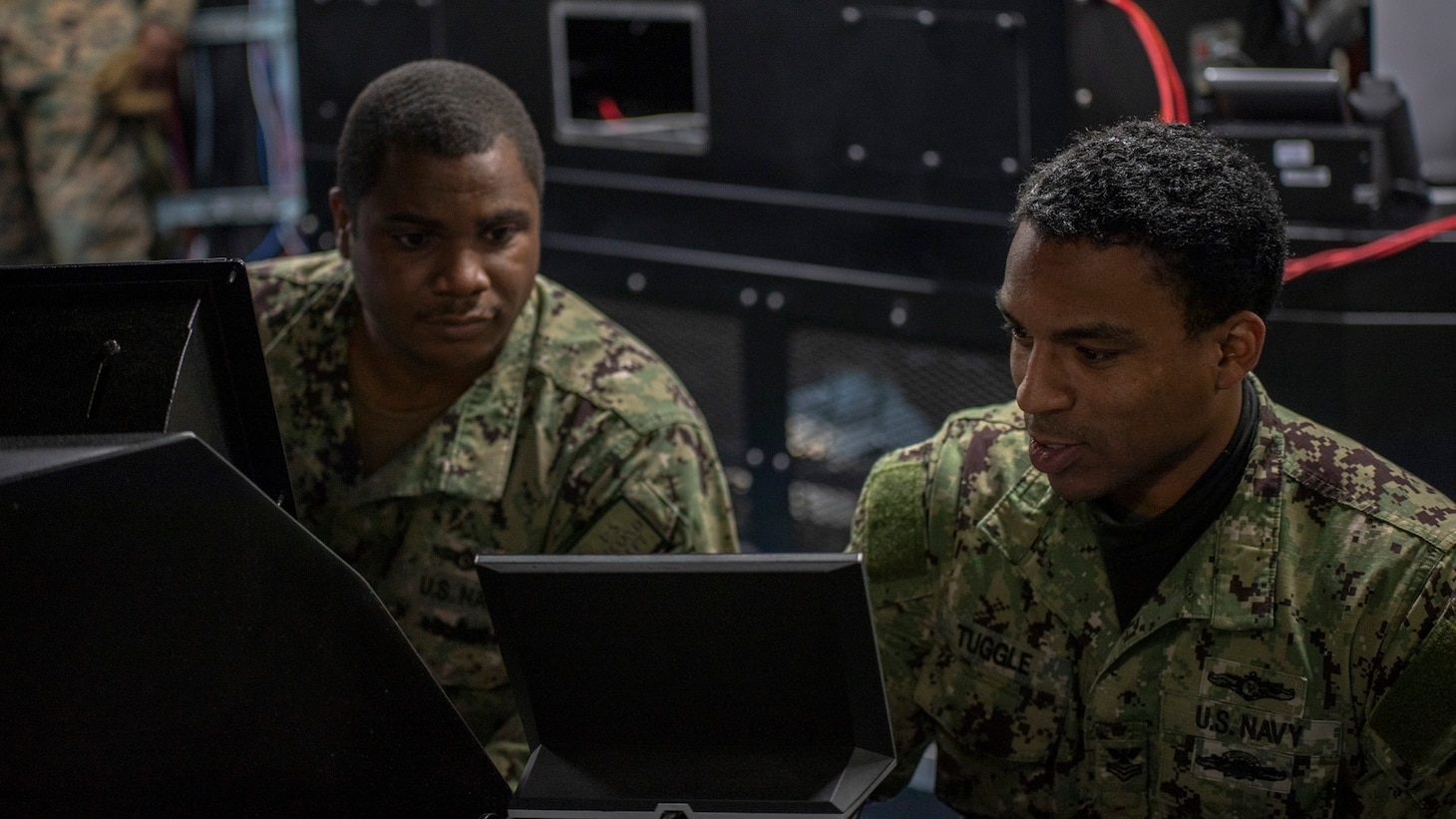 Sailors work on a computer system during NATO exercise Steadfast Defender 21.