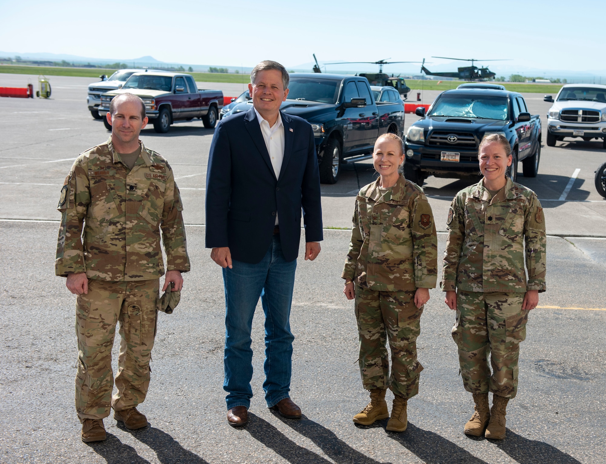From left to right, Lt Col. Kevin Weaver, 40th Helicopter Squadron commander, Sen. Steve Daines, Col. Anita Feugate Opperman, 341st Missile Wing commander, and Lt. Col. Michelle Sterling, 341st Civil Engineer Squadron commander; pose for a photo June 3, 2021, during Daines’ trip to Malmstrom Air Force Base, Mont.