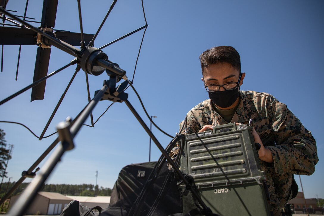 U.S. Marine Corps Cpl. Owen Trinidad, a radio operator, gets a radio check at Fort Jackson, South Carolina, May 1, 2021. Marines with 2nd Transportation Battalion, Combat Logistics Regiment 2, 2nd Marine Logistics Group conducted a convoy across the United States starting in Camp Lejeune, North Carolina and arriving at Marine Corps Air Ground Combat Center Twentynine Palms, California, in on of the longest convoys in recent Marine Corps history. (U.S. Marine Corps photo by Lance Cpl. Scott Jenkins)
