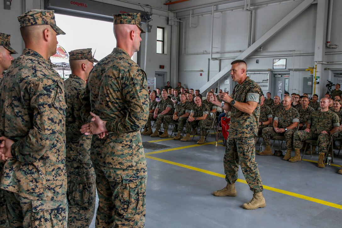 U.S. Marine Corps Col. David Mills, regimental commander of Combat Logistics Regiment 2, speaks at a ceremony at Camp Lejeune, North Carolina, June 3, 2021. Marines with 2nd Transportation Battalion, Combat Logistics Regiment 2, 2nd Marine Logistics Group conducted a convoy across the United States starting in Camp Lejeune, North Carolina, in one of the longest convoys in recent Marine Corps history. Marines on the convoy experimented with long-range communications, as far away as Marine Corps Air Ground Combat Center Twentynine Palms, California, the half-way point on the route. (U.S. Marine Corps photo by Cpl. Christian M. Garcia)