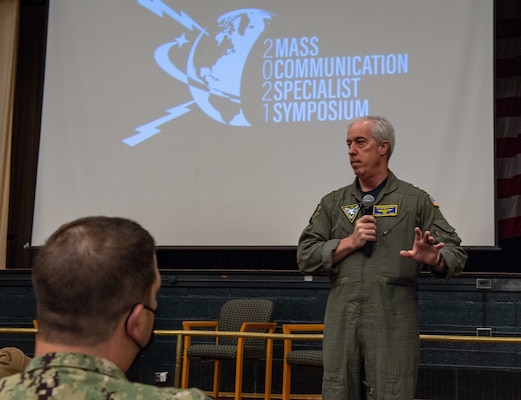 Rear Adm. John F. Meier, commander, Naval Air Force Atlantic (CNAL), speaks at the 2021 Mass Communication Specialist Symposium.