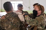 American and Syrian medics practice medical techniques.