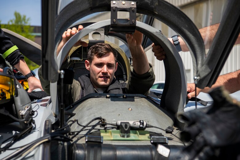 U.S. Air Force Capt. Garrett Gamble, 7th Operational Support Squadron current operations flight commander, climbs into a Berkut at Santa Monica, Calif., April 14, 2021.