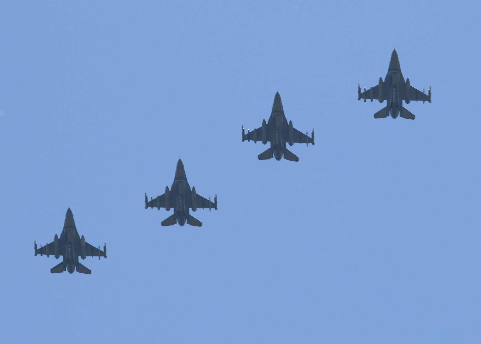 Four U.S. Air Force F-16 Fighting Falcons assigned to the 555th Fighter Squadron participating in Falcon Strike 21 (FS21) fly in formation over Amendola Air Base, Italy, June 4, 2021. Six U.S. Air Force F-16C aircraft are participating in Falcon Strike 21 (FS21), an exercise involving service members from the U.S., Israel, Italy and the United Kingdom to integrate fourth and fifth generation fighter capabilities in a large force employment event. Exercises like FS21 provide a venue to train with other nations, build readiness, practice interoperability, and enhance enduring relationships. (U.S. Air Force photo by Airman 1st Class Brooke Moeder)