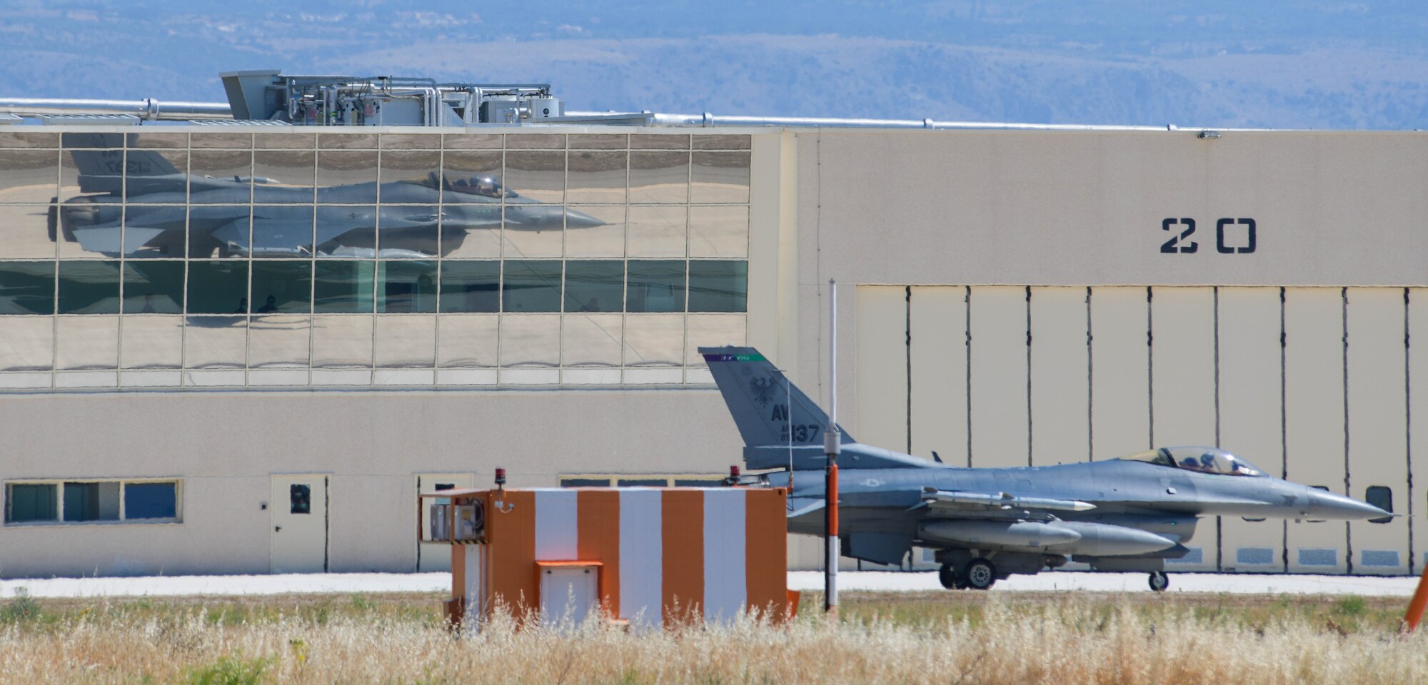 A U.S. Air Force F-16C Fighting Falcon assigned to the 555th Fighter Squadron participating in Falcon Strike 21 (FS21) taxis on the flight line at Amendola Air Base, Italy, June 4, 2021. FS21 is a joint, multinational exercise with participants from the United States working with service members from Israel, Italy, and the United Kingdom, that optimizes the integration between fourth and fifth generation aircraft, and increases the level of cooperation in the F-35 Lightning II logistics and expeditionary fields. The exercise provides participants the opportunity to test and improve shared technical and tactical knowledge while conducting complex air operations in a contested multinational joint forces environment. (U.S. Air Force photo by Airman 1st Class Brooke Moeder)