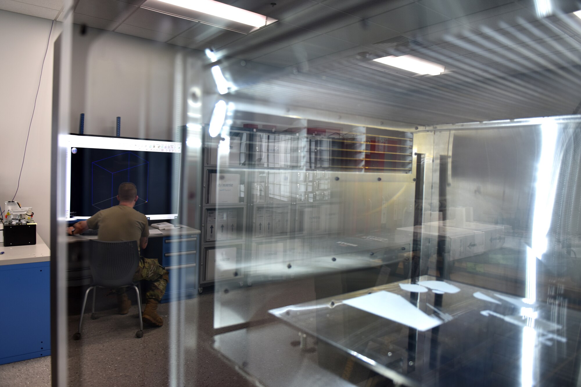 Master Sgt. Michael Howard, aircraft metals technician 911th Maintenance Squadron fabrication flight, uses a computer-aided design program to send a CAD file of an aircraft part file to a 3D printer for production at the Pittsburgh International Airport Air Reserve Station, May 10, 2021.