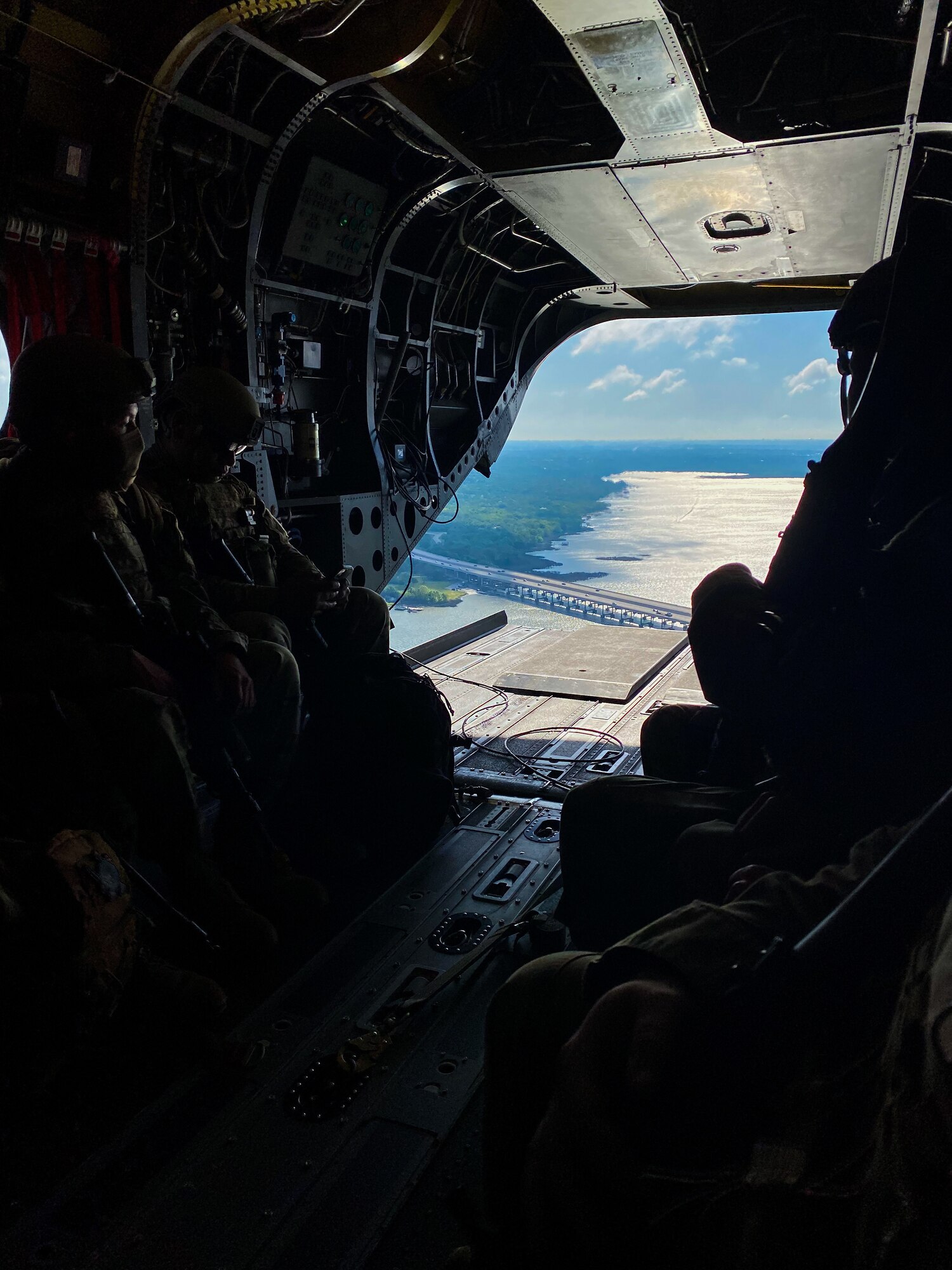 Airman surveys area of operations on C-130 ramp