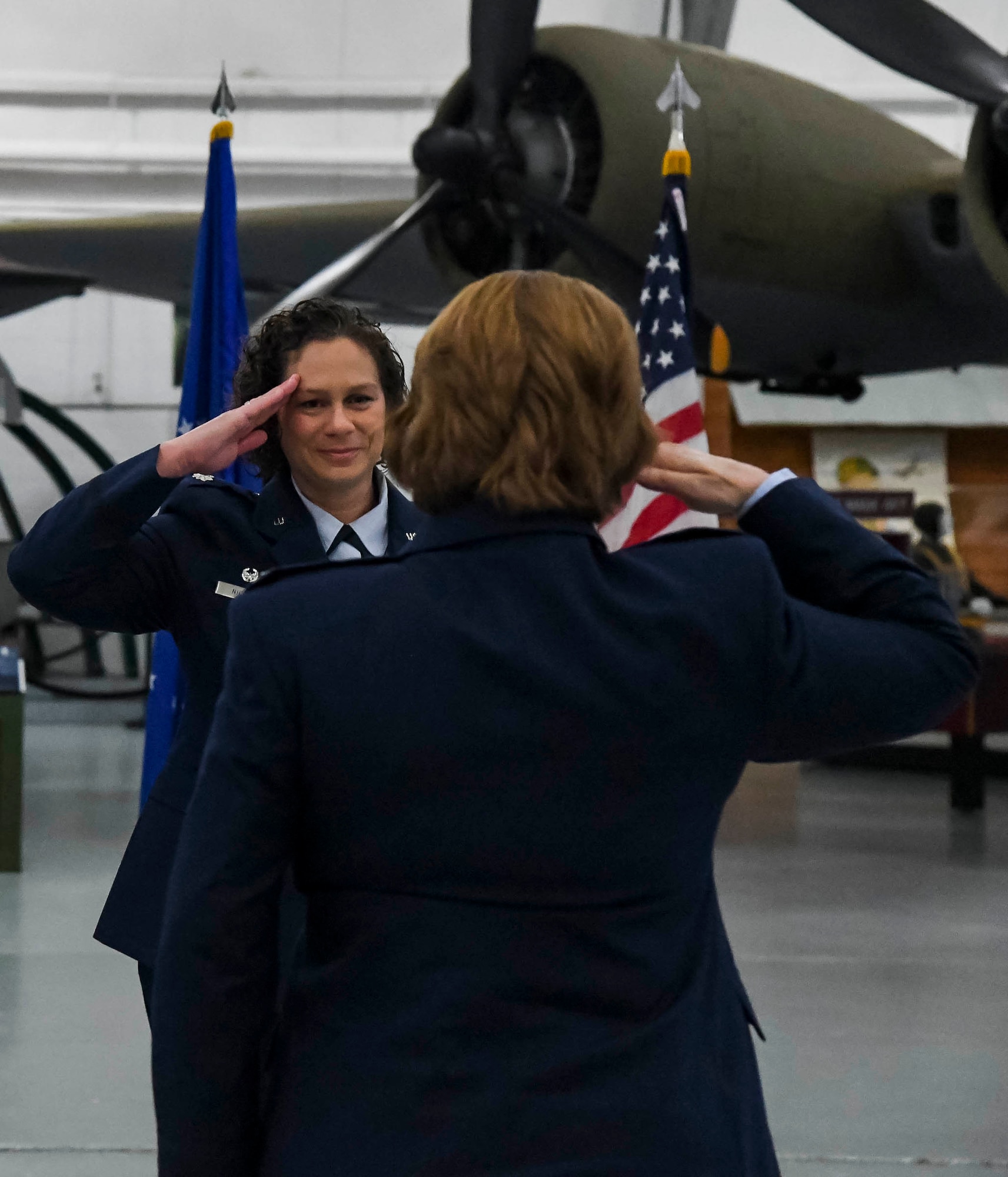 Lt. Col. Kristen Nichols, incoming 436th Operational Medical Readiness Squadron commander, renders a first salute to Lt. Col. Jessica Weaver, 436th OMRS dental flight commander, during a change of command ceremony on Dover Air Force Base, Delaware, May 27, 2021. The ceremony saw Lt. Col. Andrew Rees relinquish command to Nichols. (U.S. Air Force photo by Airman 1st Class Stephani Barge)