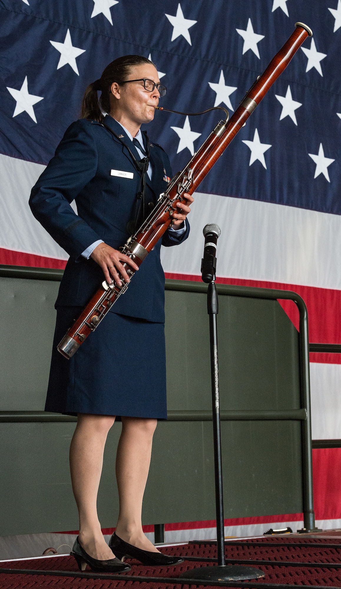 First Lt. Laura Lanier, 436th Aerial Port Squadron section commander, plays Ruffles and Flourishes during the 436th Airlift Wing Assumption of Command ceremony on Dover Air Force Base, Delaware, June 4, 2021. Col. Matthew Husemann assumed command of the Eagle Wing in a ceremony officiated by 18th Air Force commander Maj. Gen. Thad Bibb. (U.S. Air Force photo by Roland Balik)