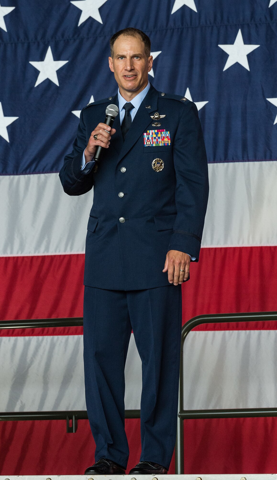 Col. Matthew Husemann, 436th Airlift Wing commander, speaks to Team Dover members, friends and family, guests, civic leaders and congressional delegates during the 436th AW Assumption of Command ceremony on Dover Air Force Base, Delaware, June 4, 2021. Husemann assumed command of the Eagle Wing, becoming Dover AFB’s 36th wing commander. (U.S. Air Force photo by Roland Balik)