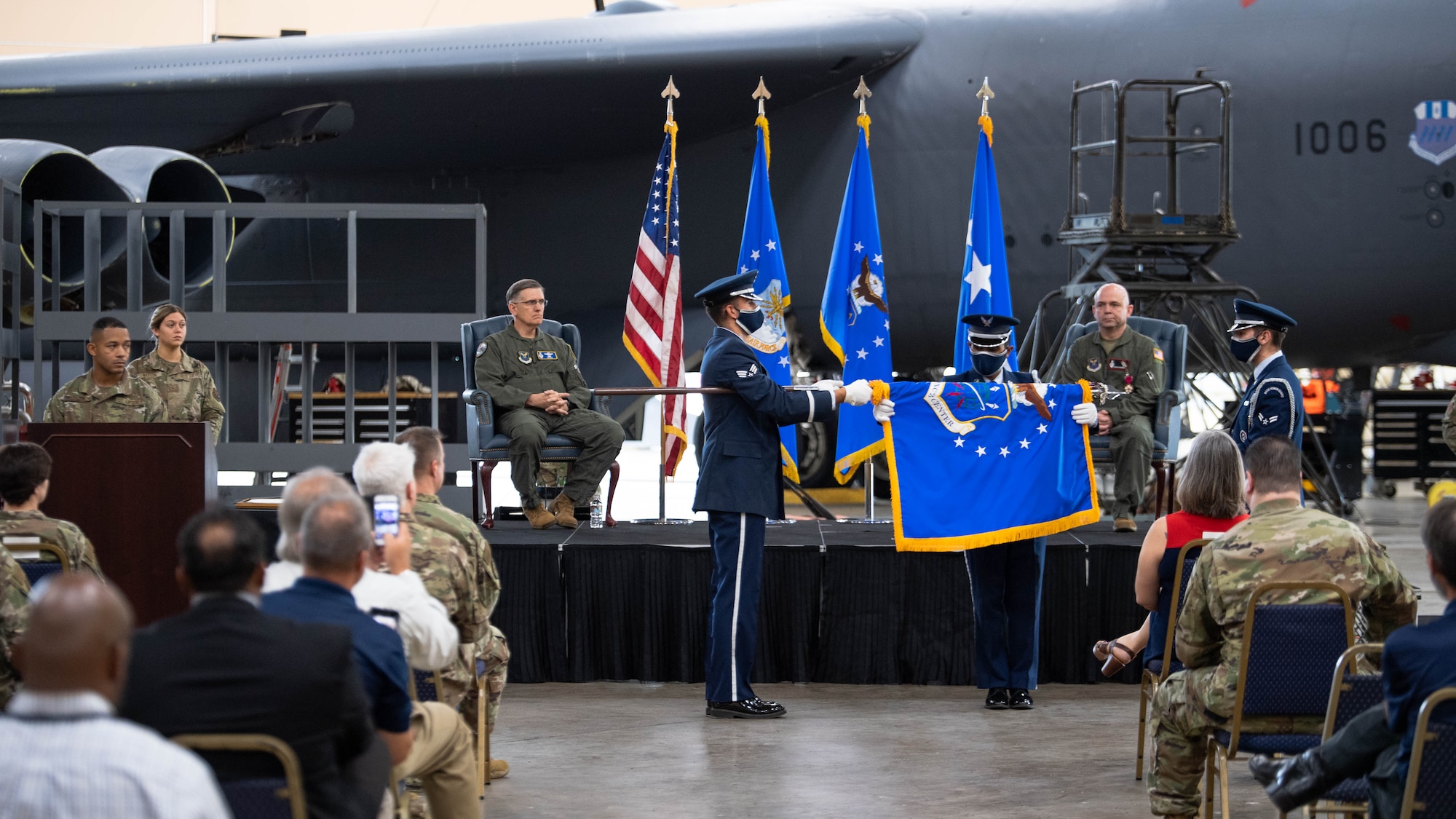 The official flag of the U.S. Air Force's Nuclear Command, Control and Communications Center is ceremoniously folded during the AFNC3 Center's deactivation ceremony at Barksdale Air Force Base, Louisiana, June 4, 2021. After making significant strides to normalize the way in which the Air Force handles nuclear command, control and communications systems, the AFNC3 Center was formally deactivated June 4. (U.S. Air Force photo by Senior Airman Jacob B. Wrightsman)