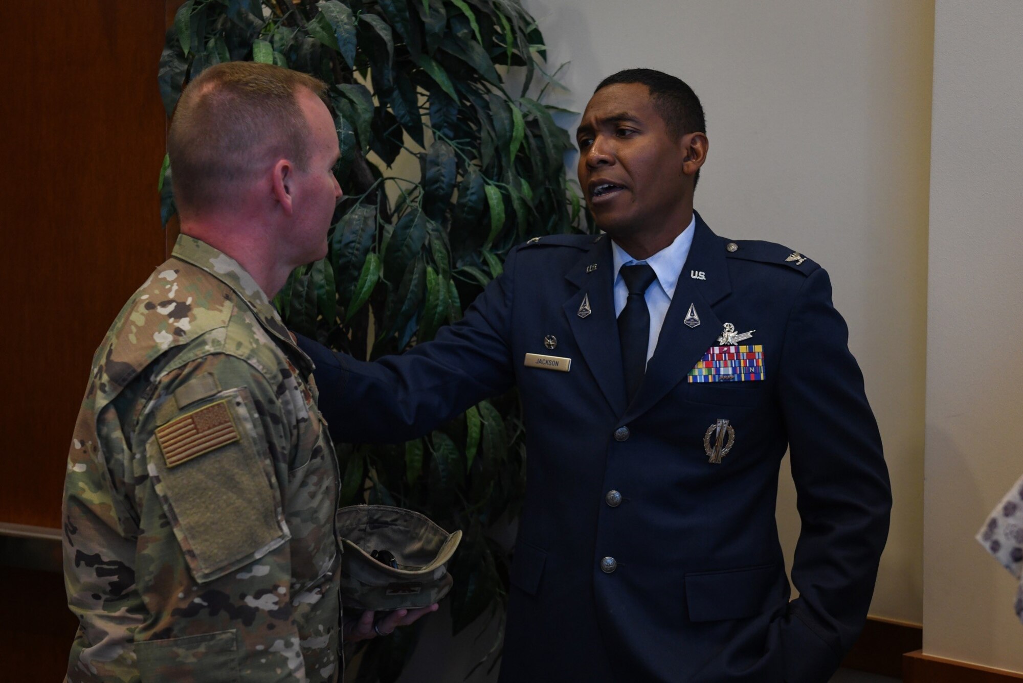 Col. Marcus Jackson, Buckley Garrison commander, thanks Col. Brian Chellgren, Buckley Garrison vice commander, for his dedication as acting commander after the Buckley Garrison Assumption of Command Ceremony at Buckley Space Force Base, Colo., June 4, 2021. Jackson expressed his gratitude towards his predecessors as well as his excitement for this leadership opportunity. (U.S. Space Force photo by Senior Airman Danielle McBride)