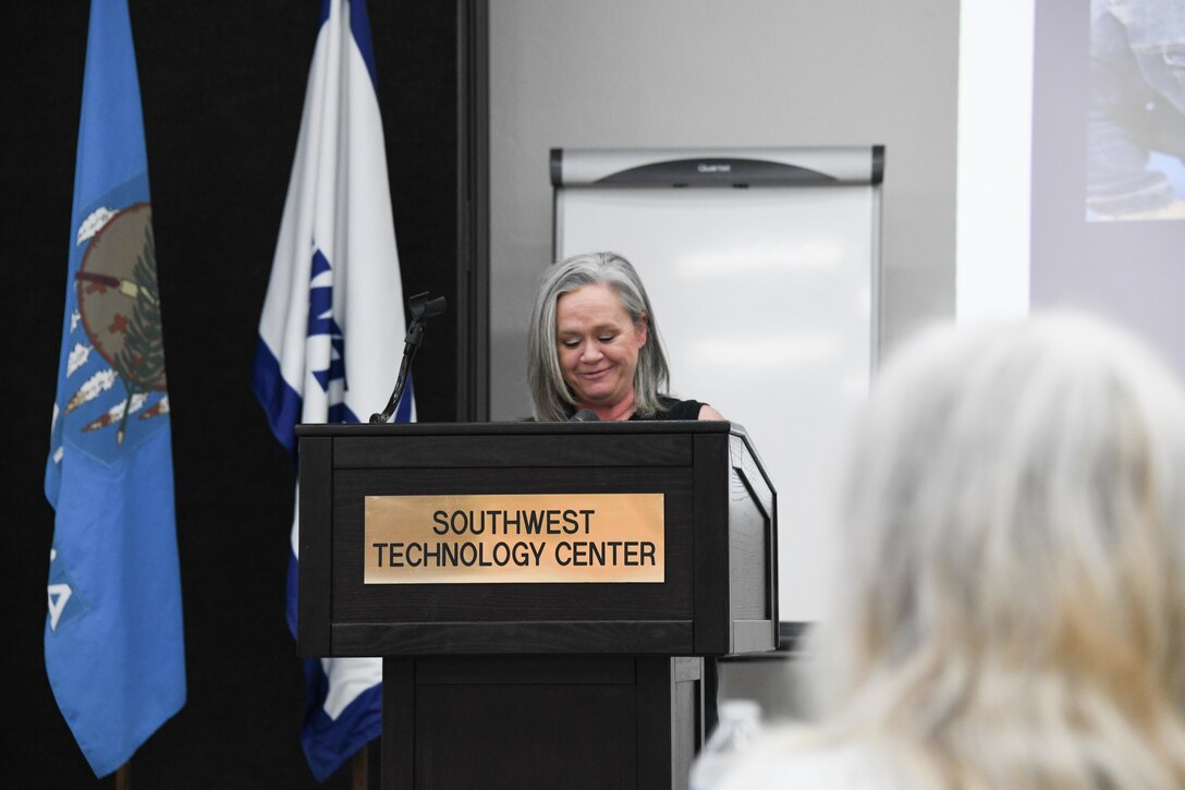 person speaks at podium