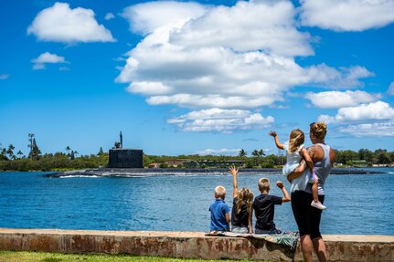 JOINT BASE PEARL HARBOR-HICKAM (June 3, 2021) -- Family members wave as the Virginia-class fast-attack submarine USS Missouri (SSN 780) departs Joint Base Pearl Harbor-Hickam for Exercise Agile Dagger 2021 (AD21). AD21 is a training exercise, with one-third of the Pacific Submarine Force getting underway, to assess warfighting readiness and build capacity for the joint force. (U.S. Navy photo by Mass Communication Specialist 1st Class Michael B. Zingaro/Released)